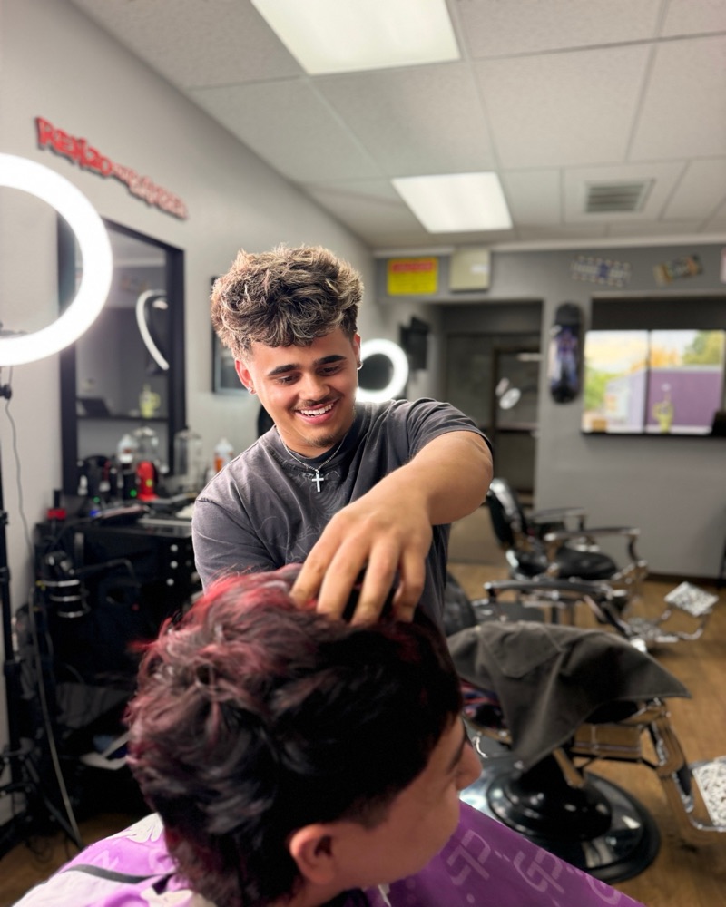 Ruben, barber at Renzos Barbershop in Fort Collins